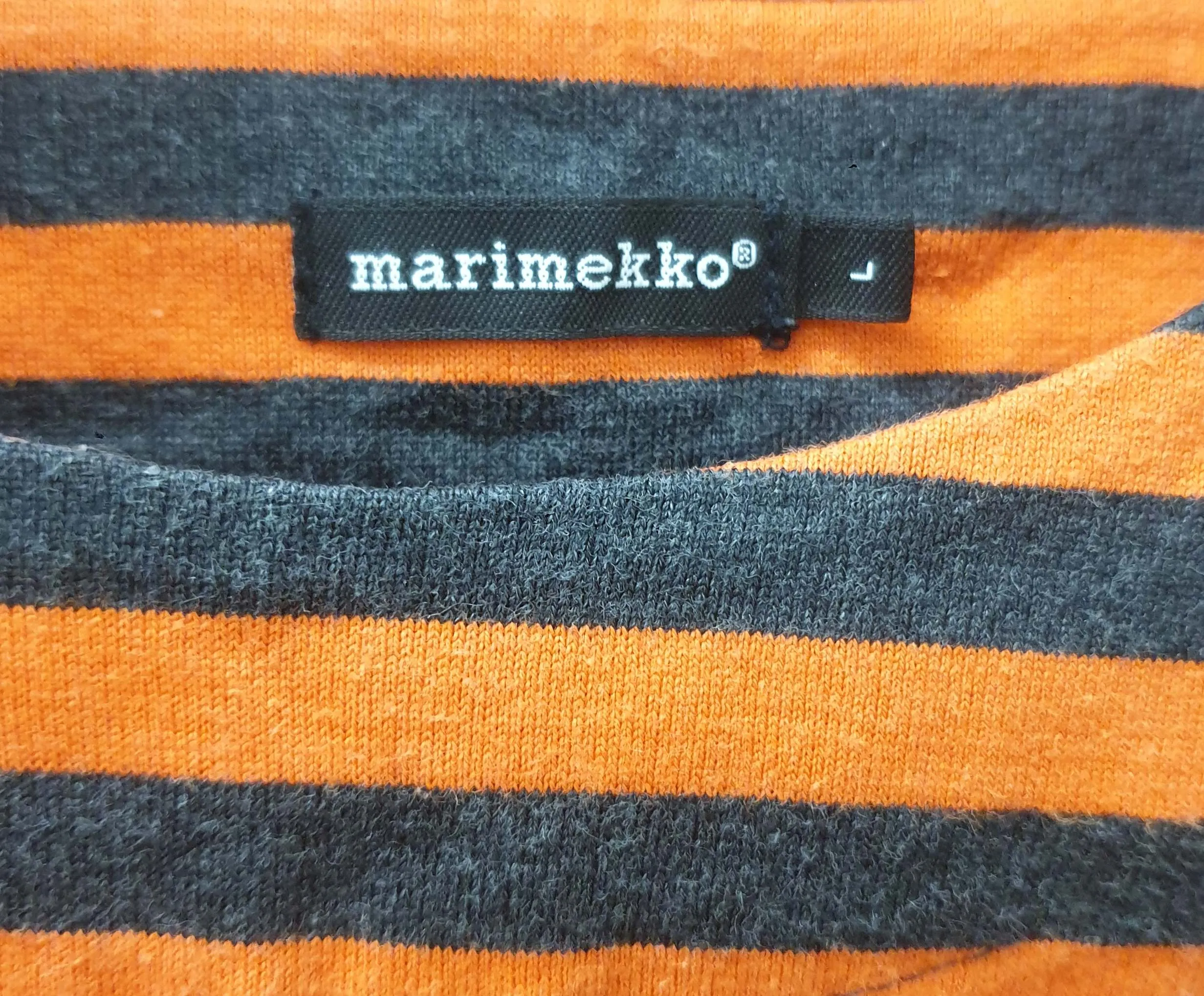 Marimekko orange and black long sleeve top size L, best fits 12-14