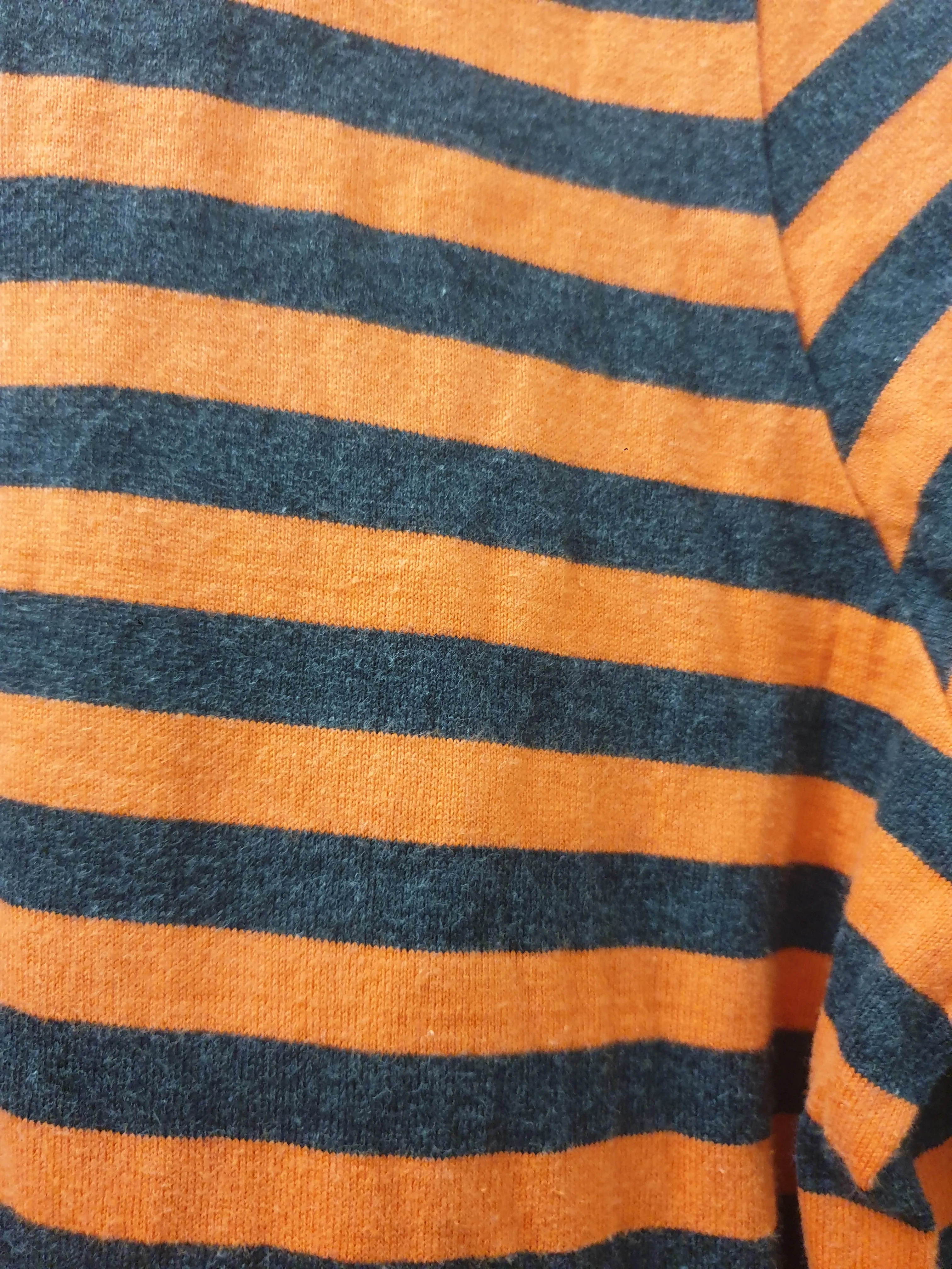 Marimekko orange and black long sleeve top size L, best fits 12-14