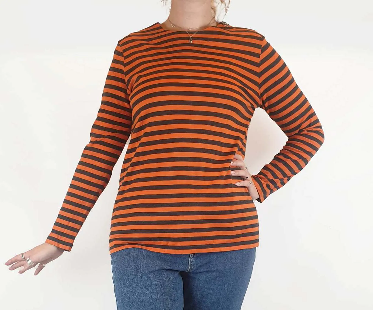 Marimekko orange and black long sleeve top size L, best fits 12-14
