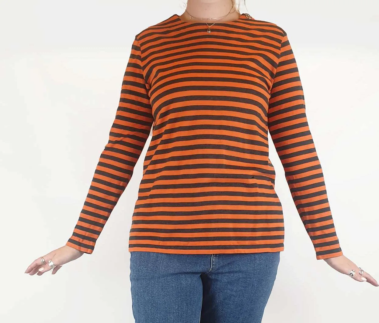 Marimekko orange and black long sleeve top size L, best fits 12-14