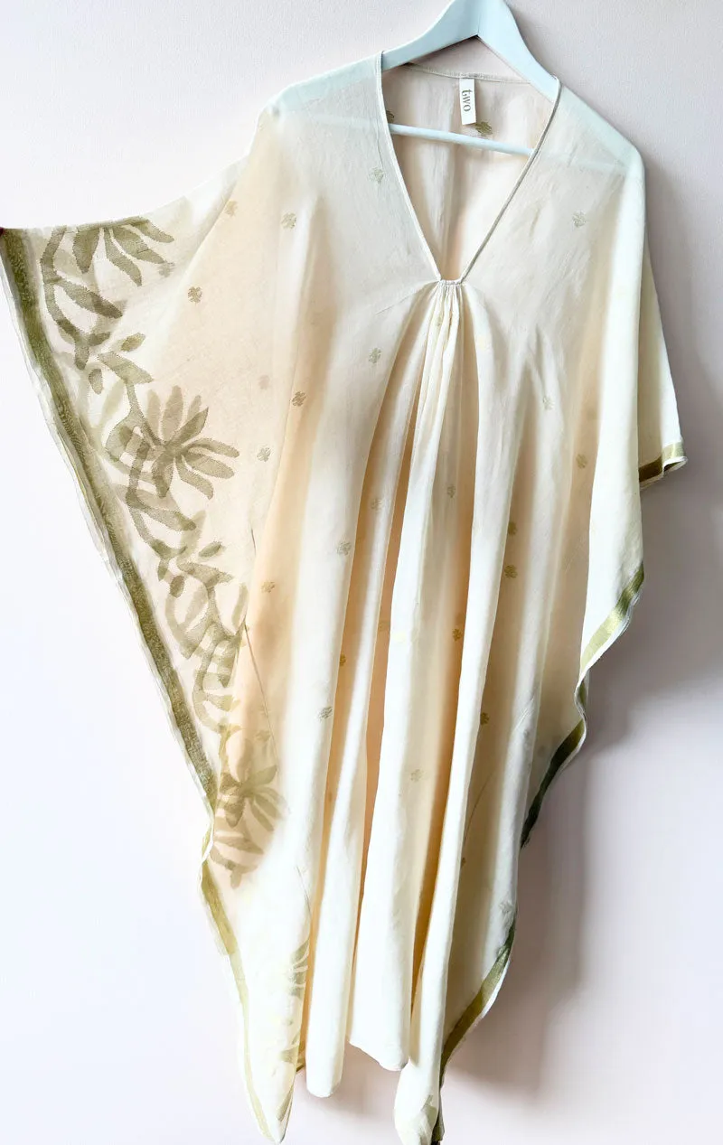 white caftan with gold floral motif