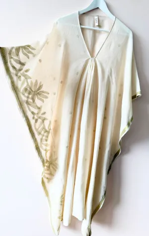 white caftan with gold floral motif